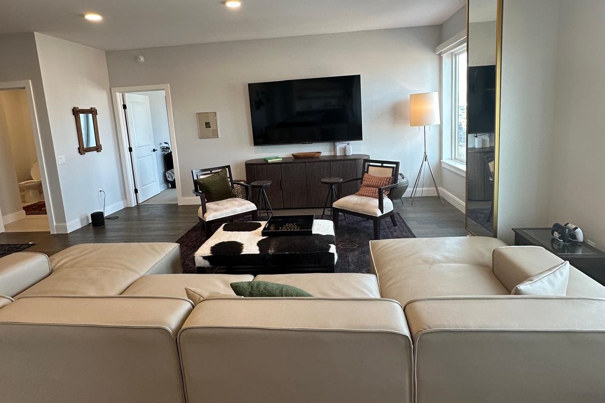 Giant Sectional Couch and 85 inch Television