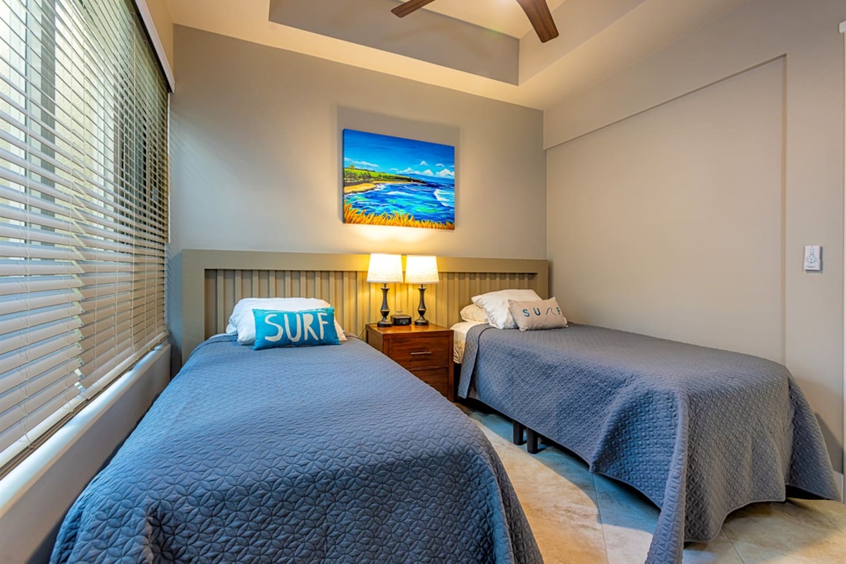 the second bedroom features two txin XL size beds that can be pushed together on request (prior to guest's arrival)