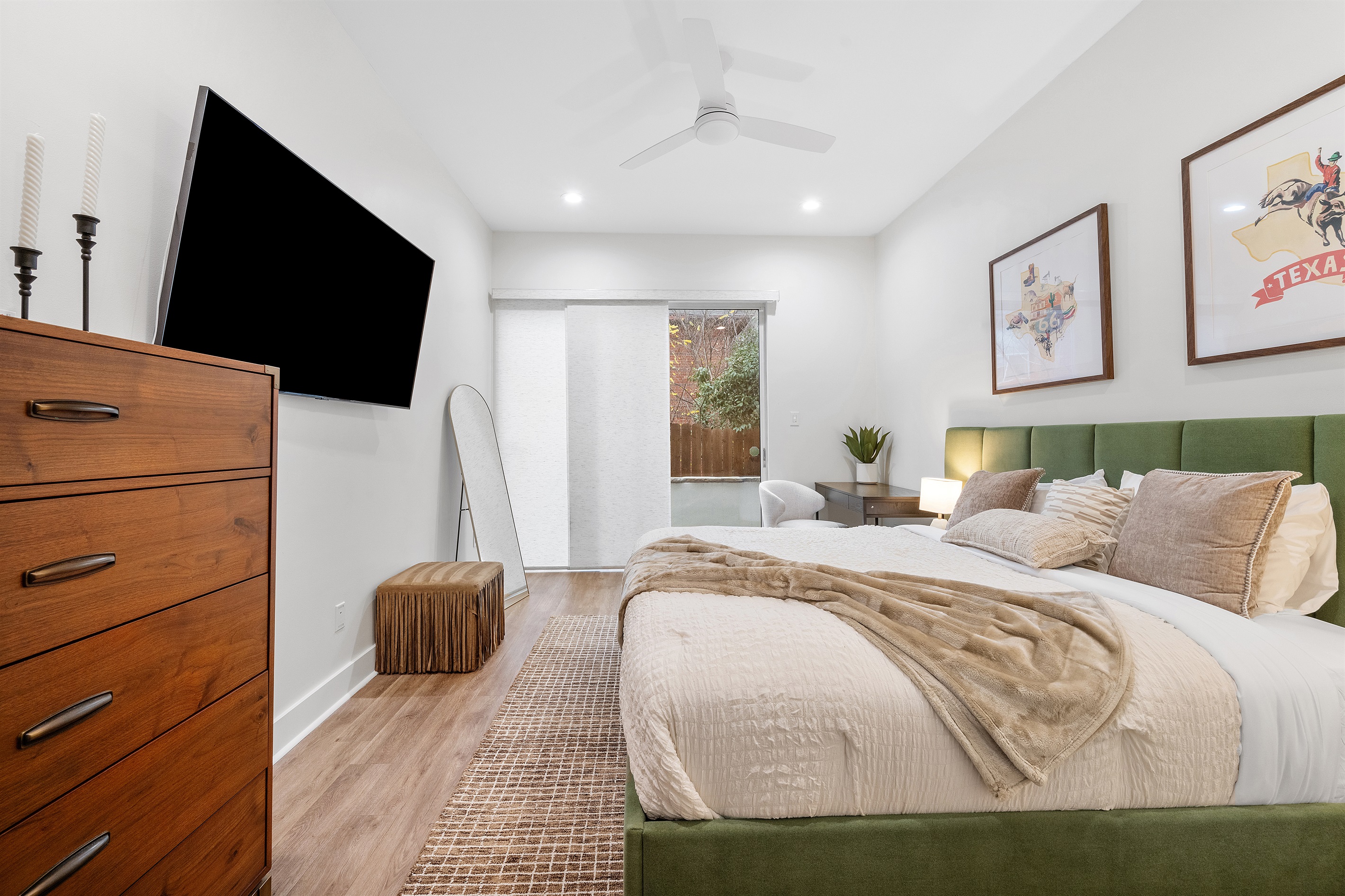 Large King size bed with Smart TV and a private patio.