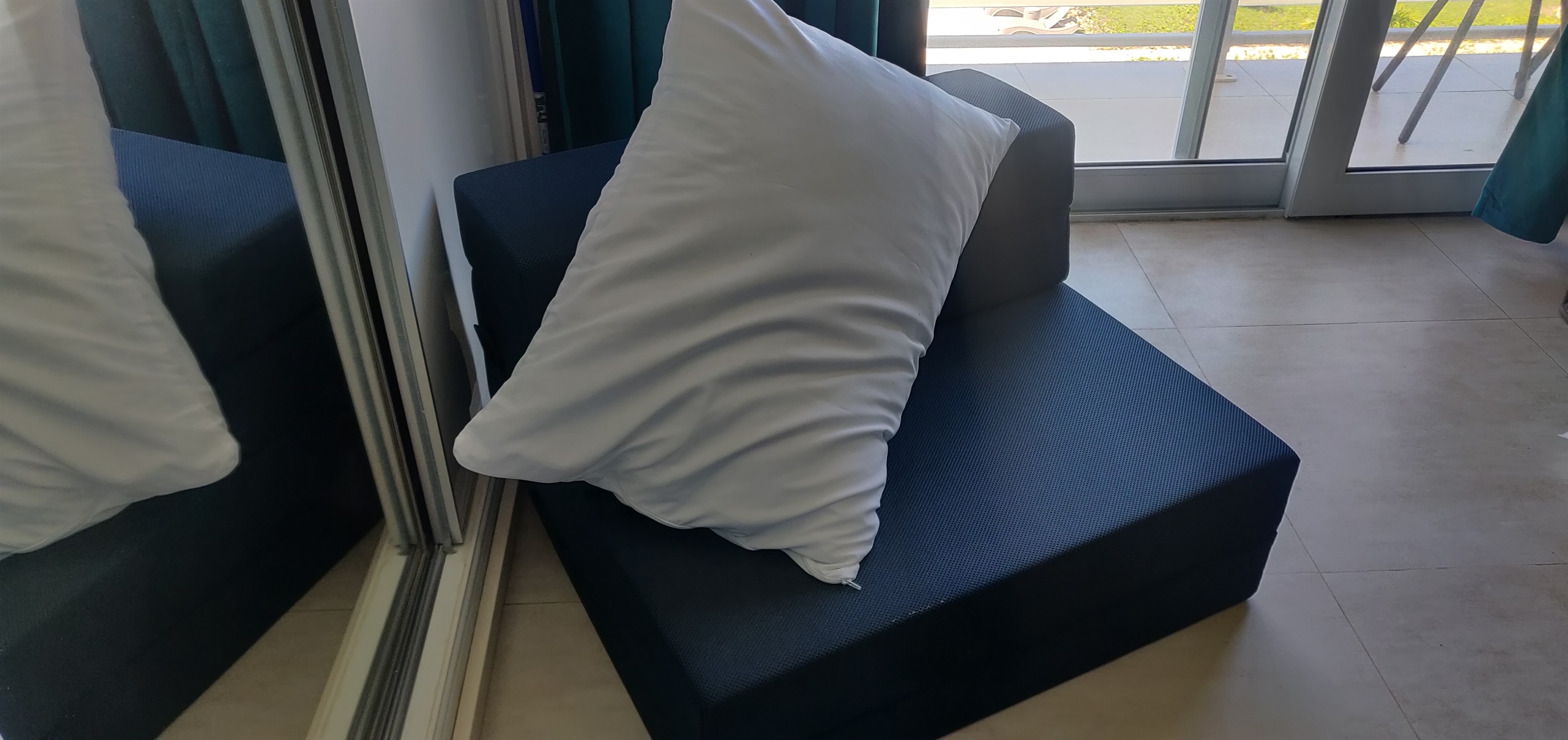 Fold up bed mat for additional guest