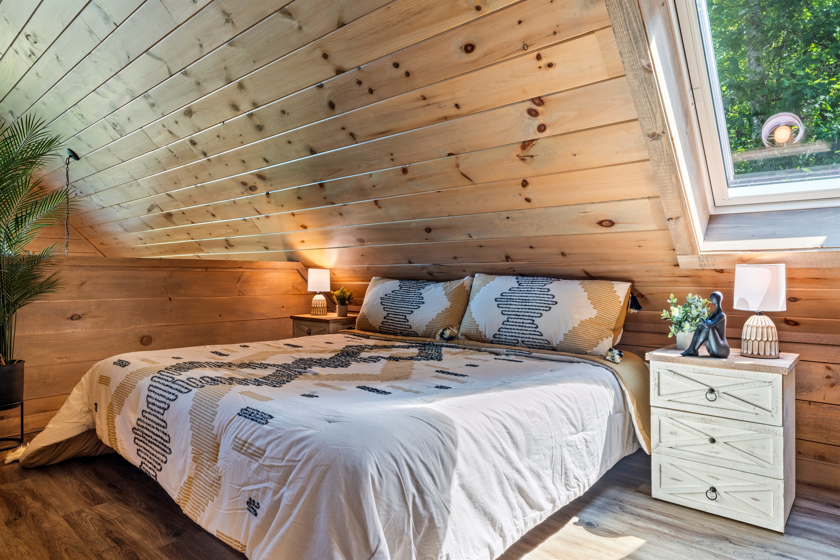 ✨ For the dreamers and stargazers—this tucked-away loft with a skylight is where cozy meets magical.