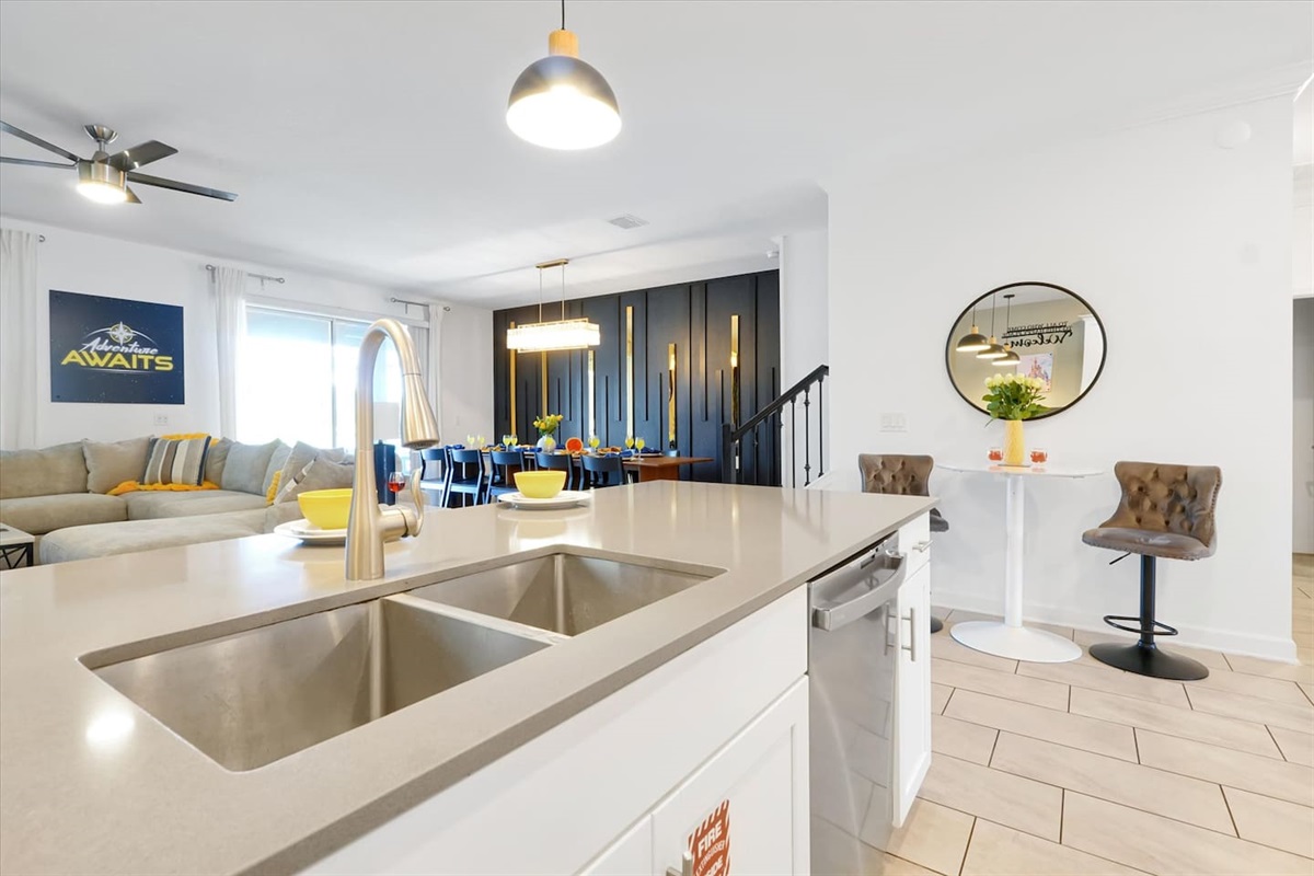 The extra large kitchen, living, dining space makes for a great place to gather, eat and enjoy company while making memories!