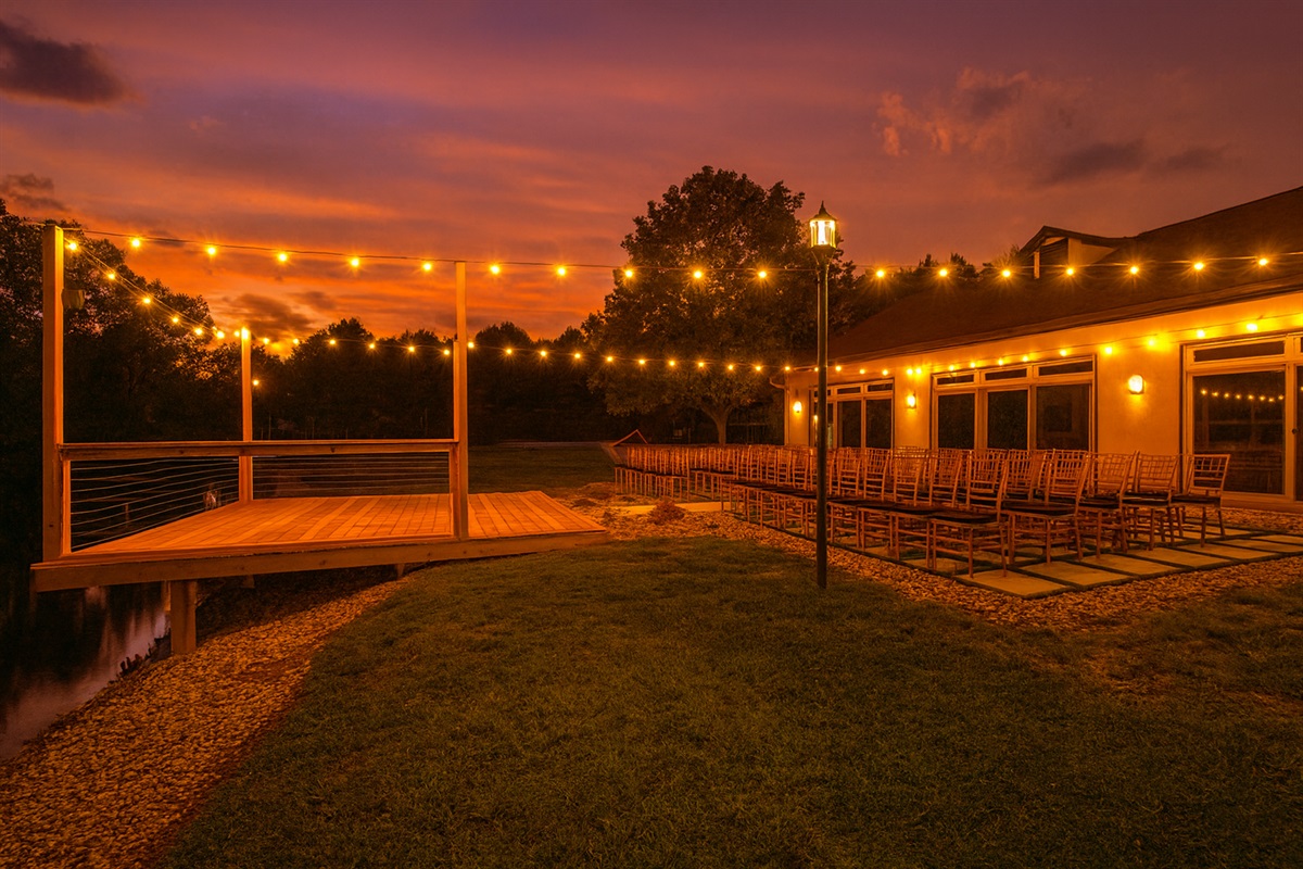 market lights over the patio at sunset