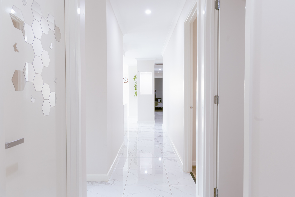 Bright hallway connecting the bedrooms and main living areas.