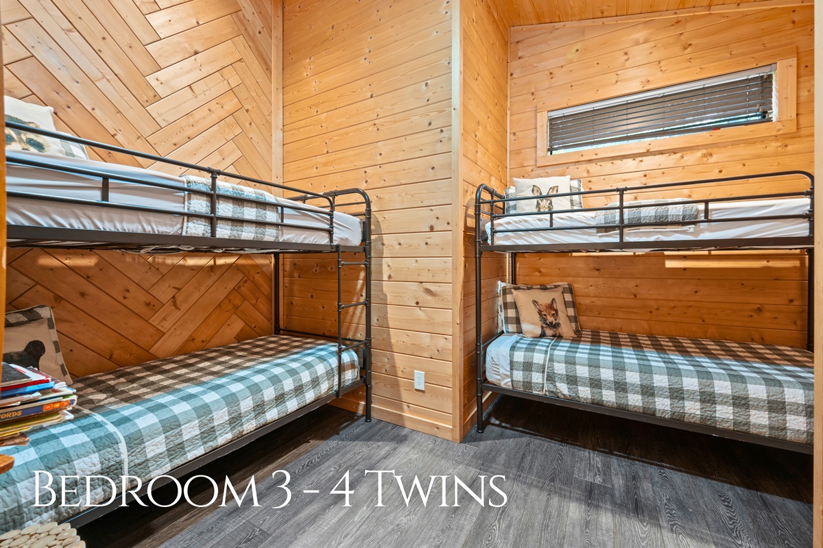 The bunk room is thoughtfully designed to accommodate a group, offering plenty of sleeping space without sacrificing comfort.