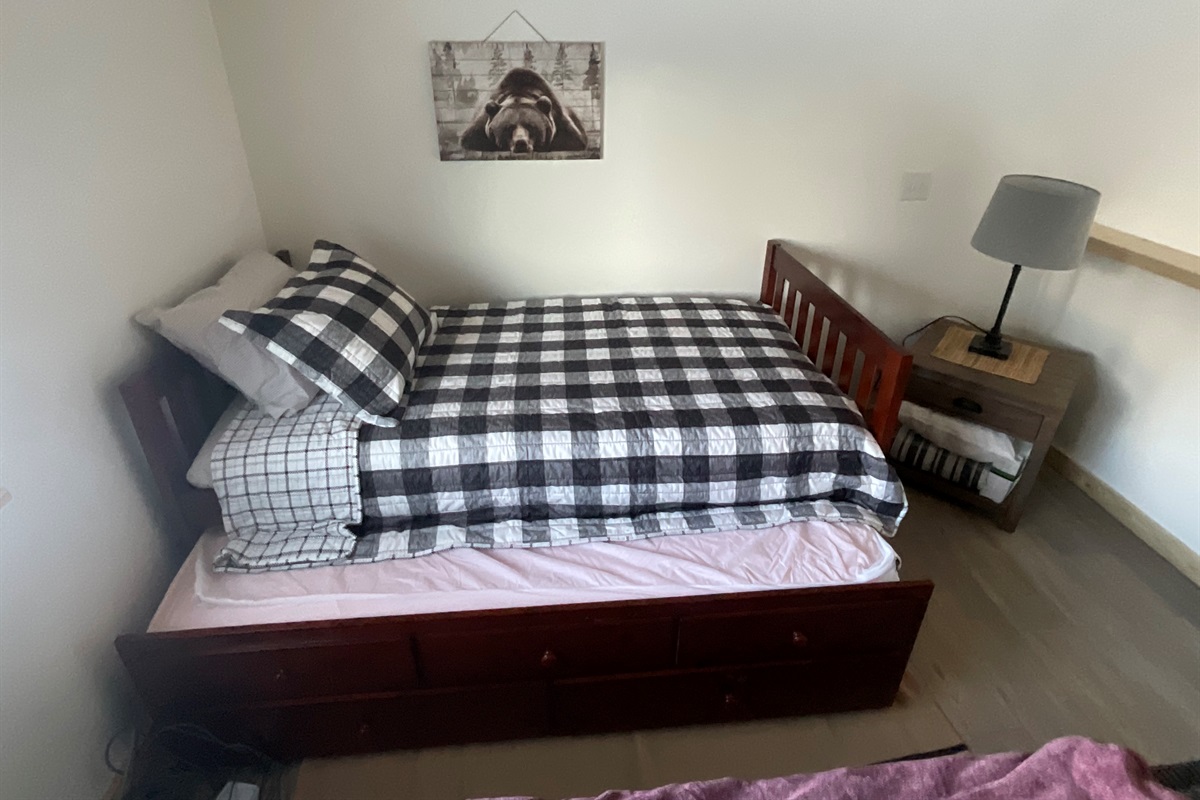 Loft - additional twin bed with trundle bed [photo is representative but may not be from this cabin].