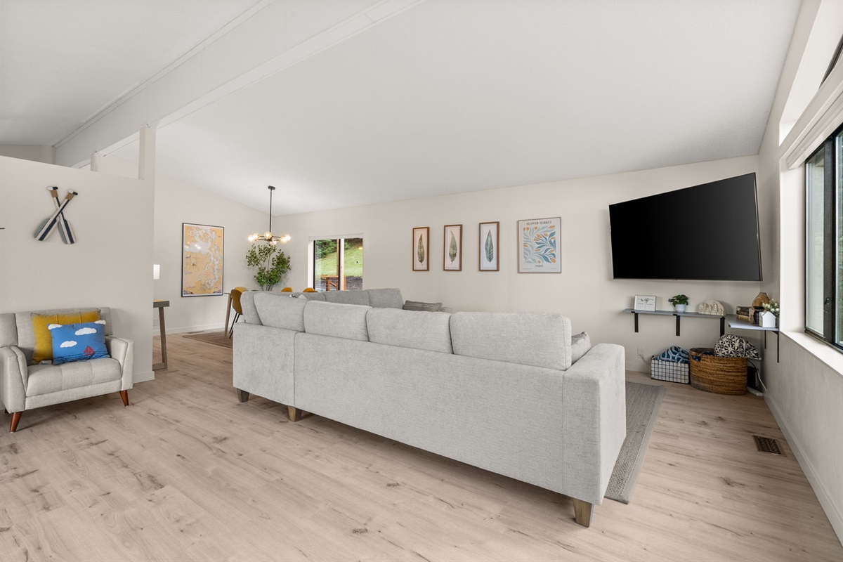 Open living and dining spaces designed for comfort, connection, and plenty of natural light