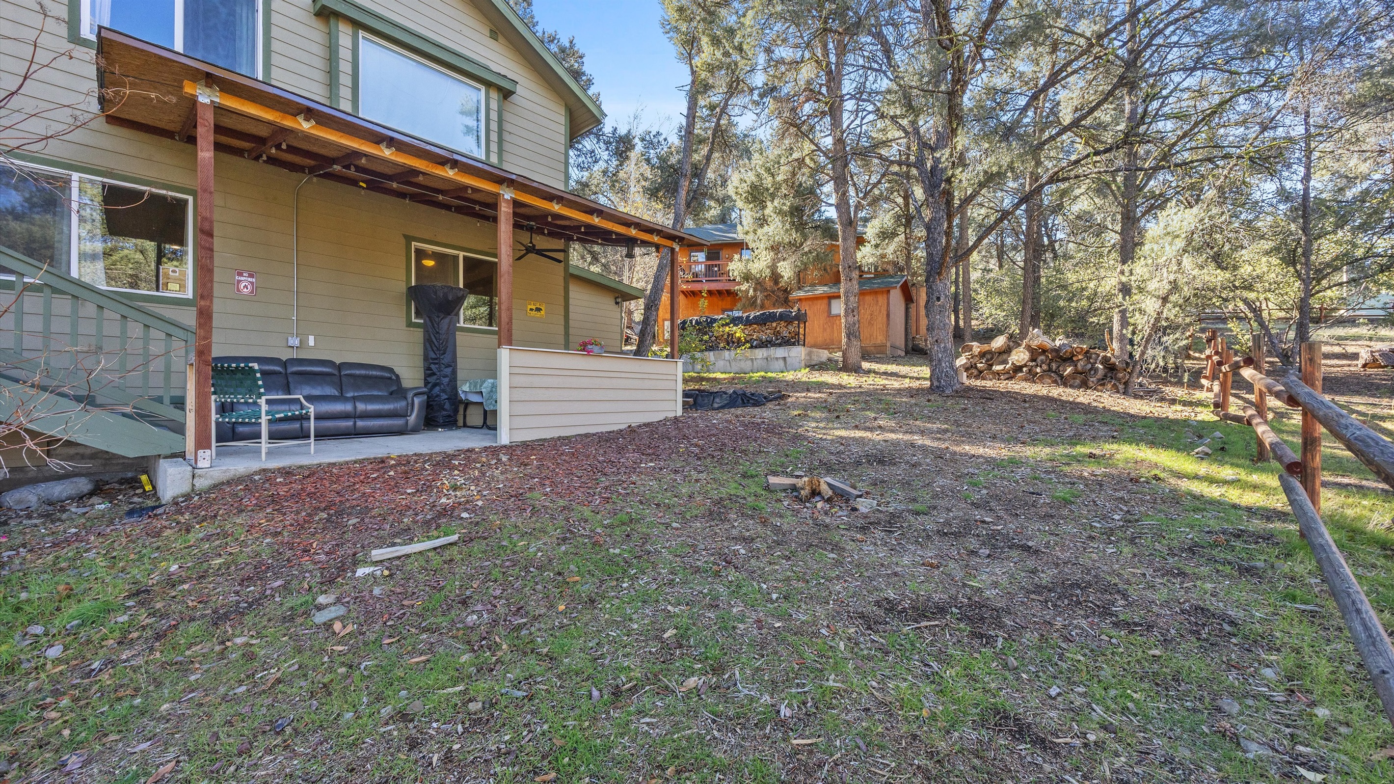Serene back patio, surrounded by peaceful nature and fresh mountain air.