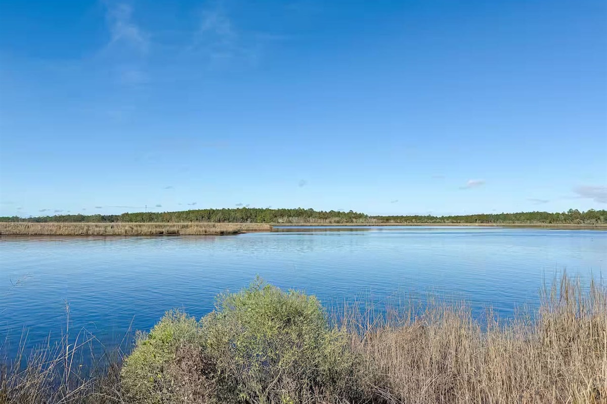 Tranquil waterfront views with calm waters and open skies—perfect for relaxing and soaking in the coastal scenery.