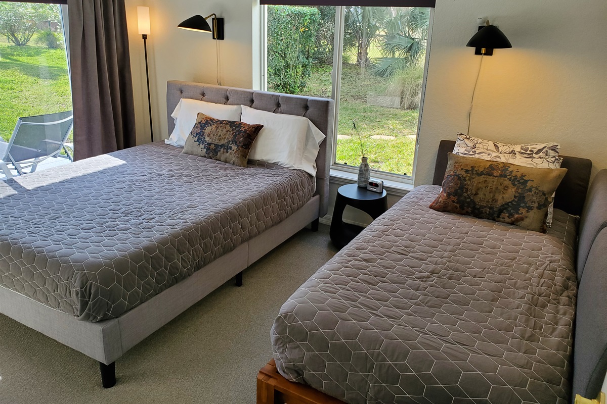 Queen and Twin bedroom with lanai access and private bath