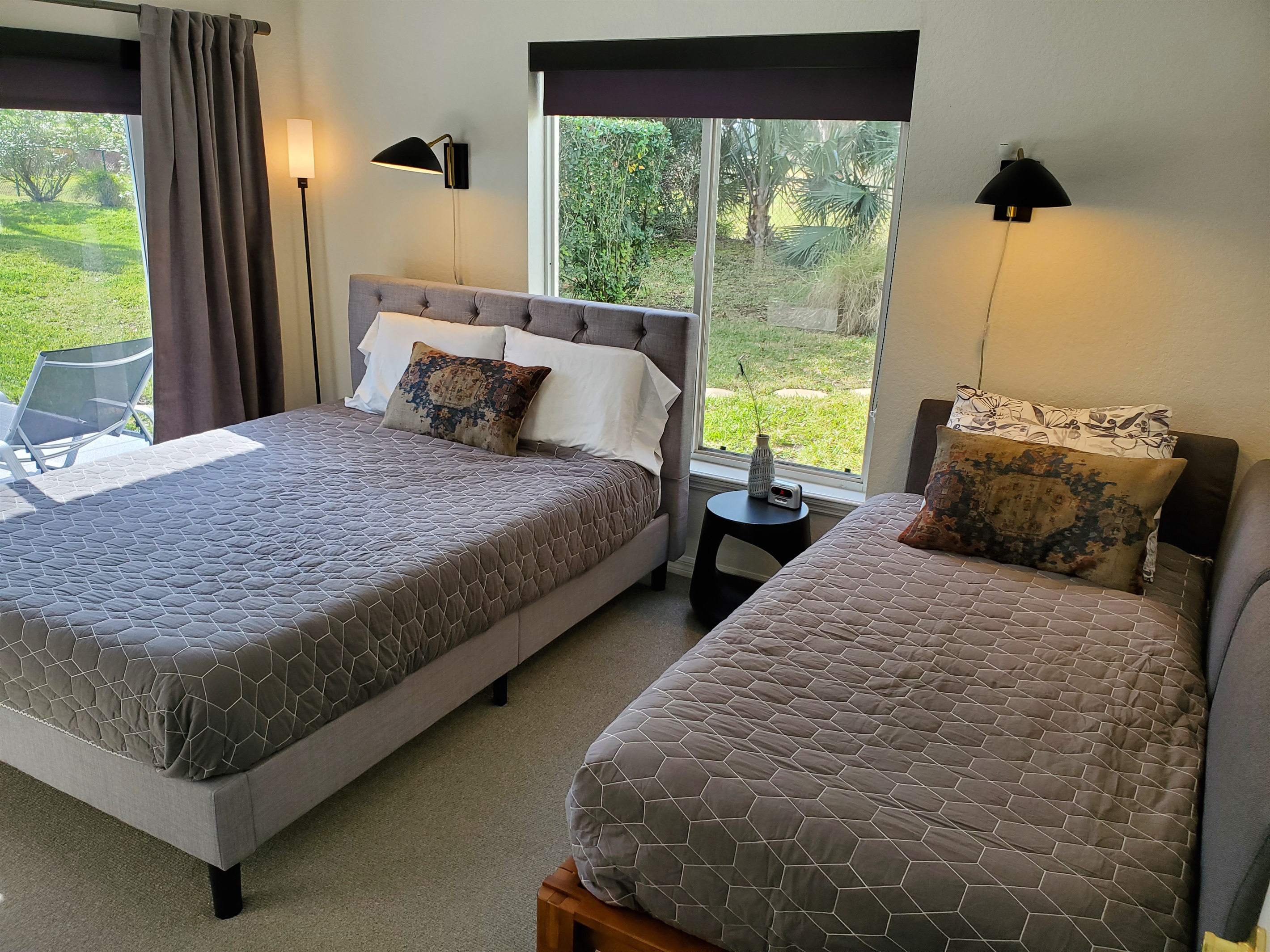 Queen and Twin bedroom with lanai access and private bath