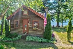 From the parking lot facing the log cabin and the lakefront