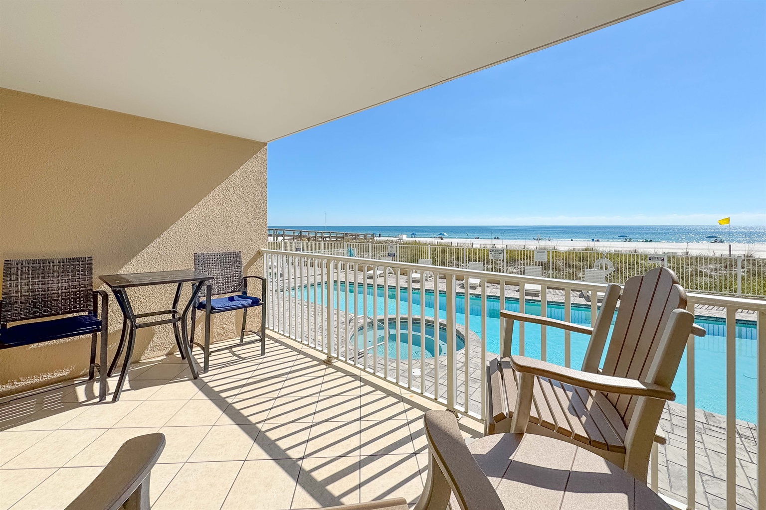 Direct oceanfront balcony offering stunning views and seamless indoor-outdoor living.  A true coastal retreat.