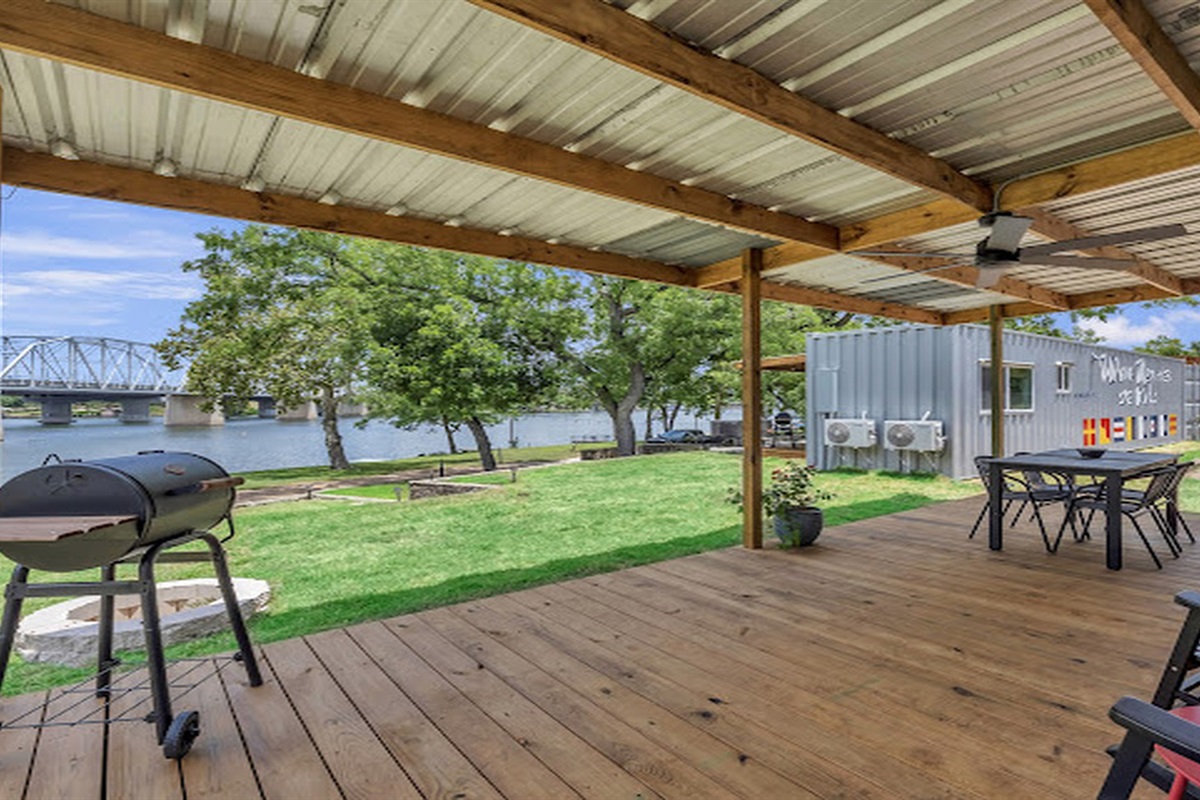 Fire up the grill and enjoy easy outdoor living by the river.
