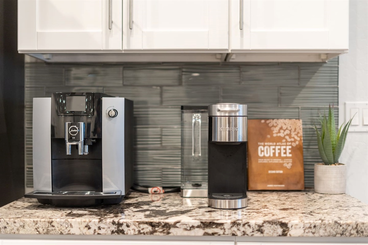 Convenient coffee station featuring a modern coffee maker alongside a selection of coffee essentials for a perfect morning brew.