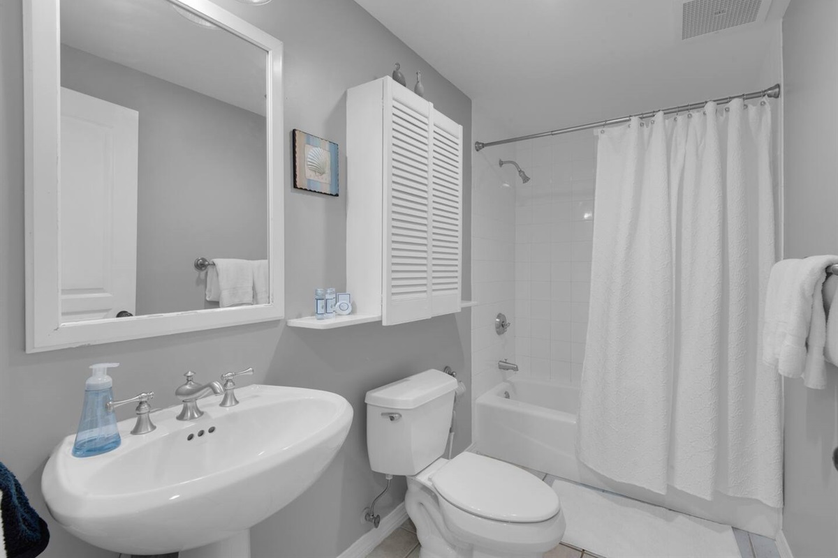 First bathroom, shower/tub combo