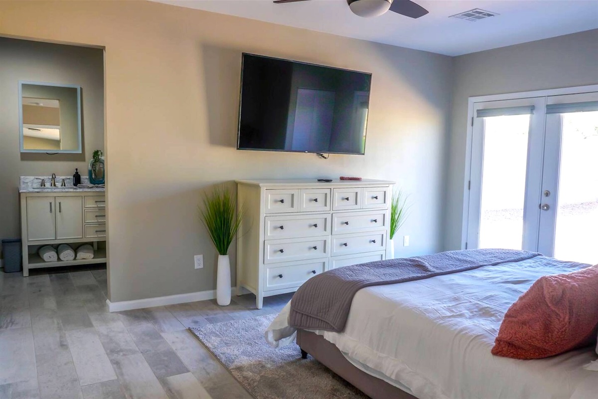 Relax in the evenings with your favorite show in the master room.