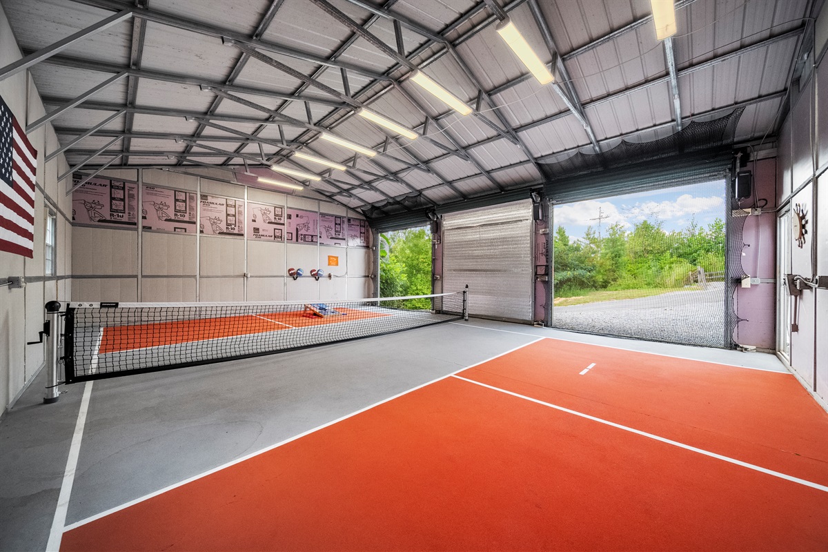 Open the 2 end garage doors and let the fun begin. Pickle ball, corn hole or just hanging out, this garage enhances your enjoyment. Send the troops out play while you go in the hot tub for some peace and quiet.