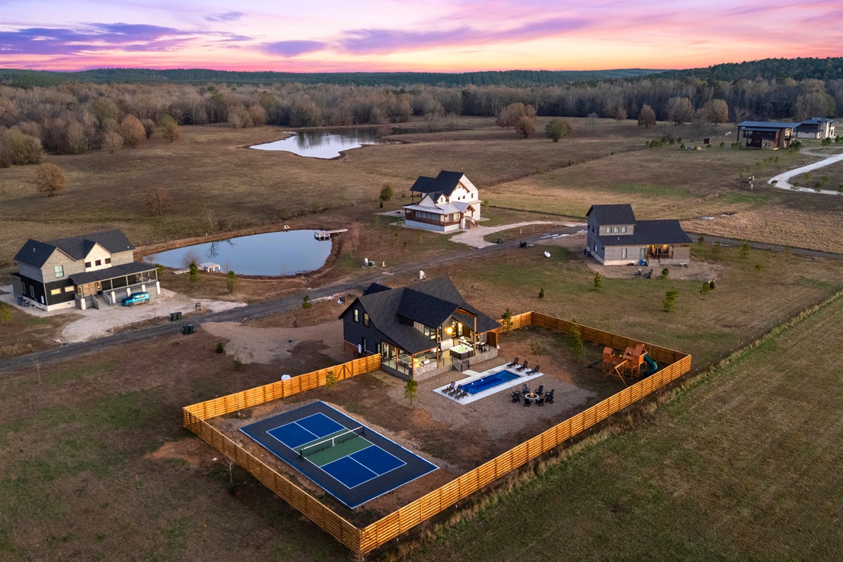 A wider angle shows how the property fits into the rolling countryside, offering privacy and open space all around.