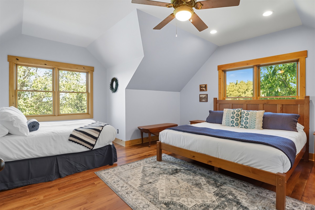 Large bedroom suite with plenty of natural light.