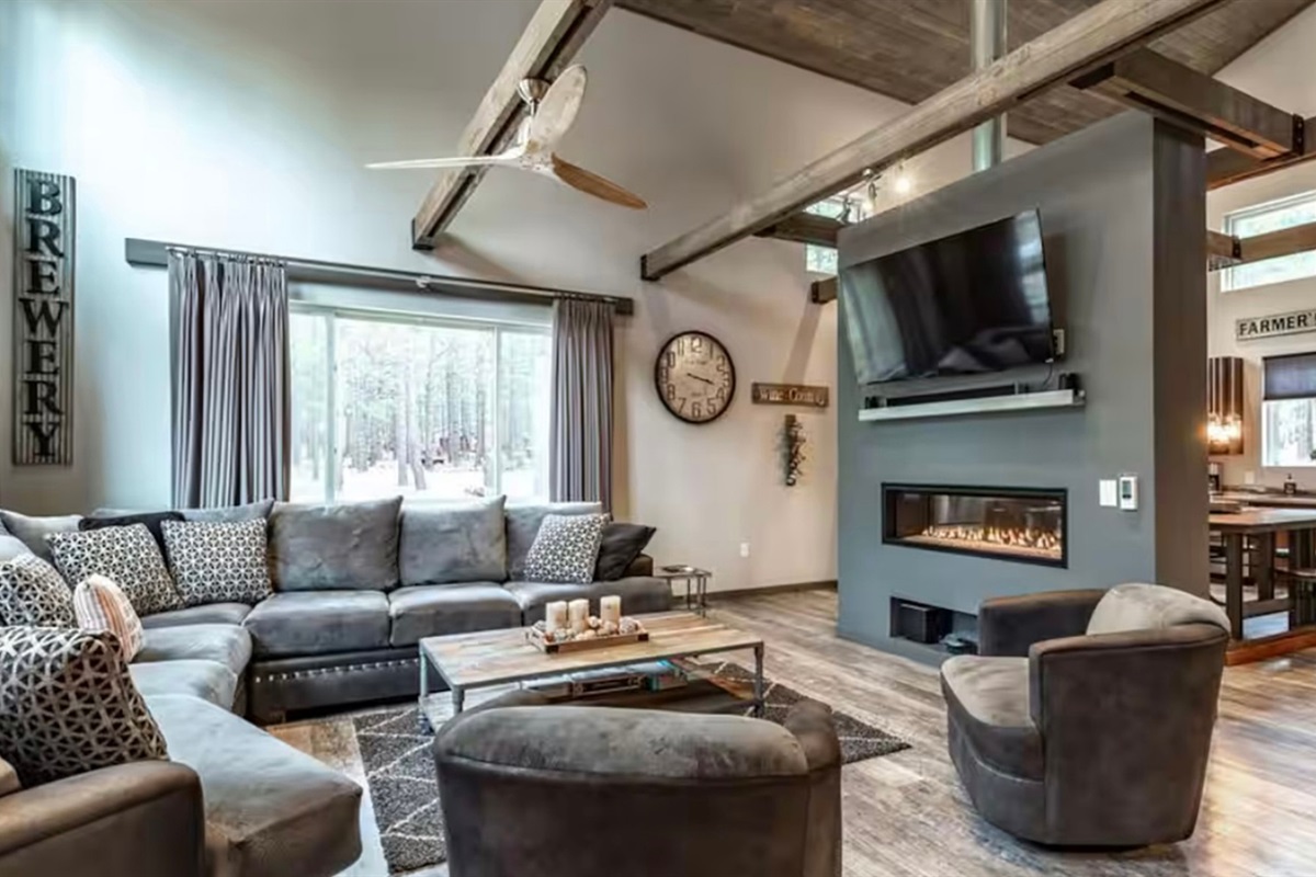Cozy gathering space with fireplace and plenty of seating for the whole group.