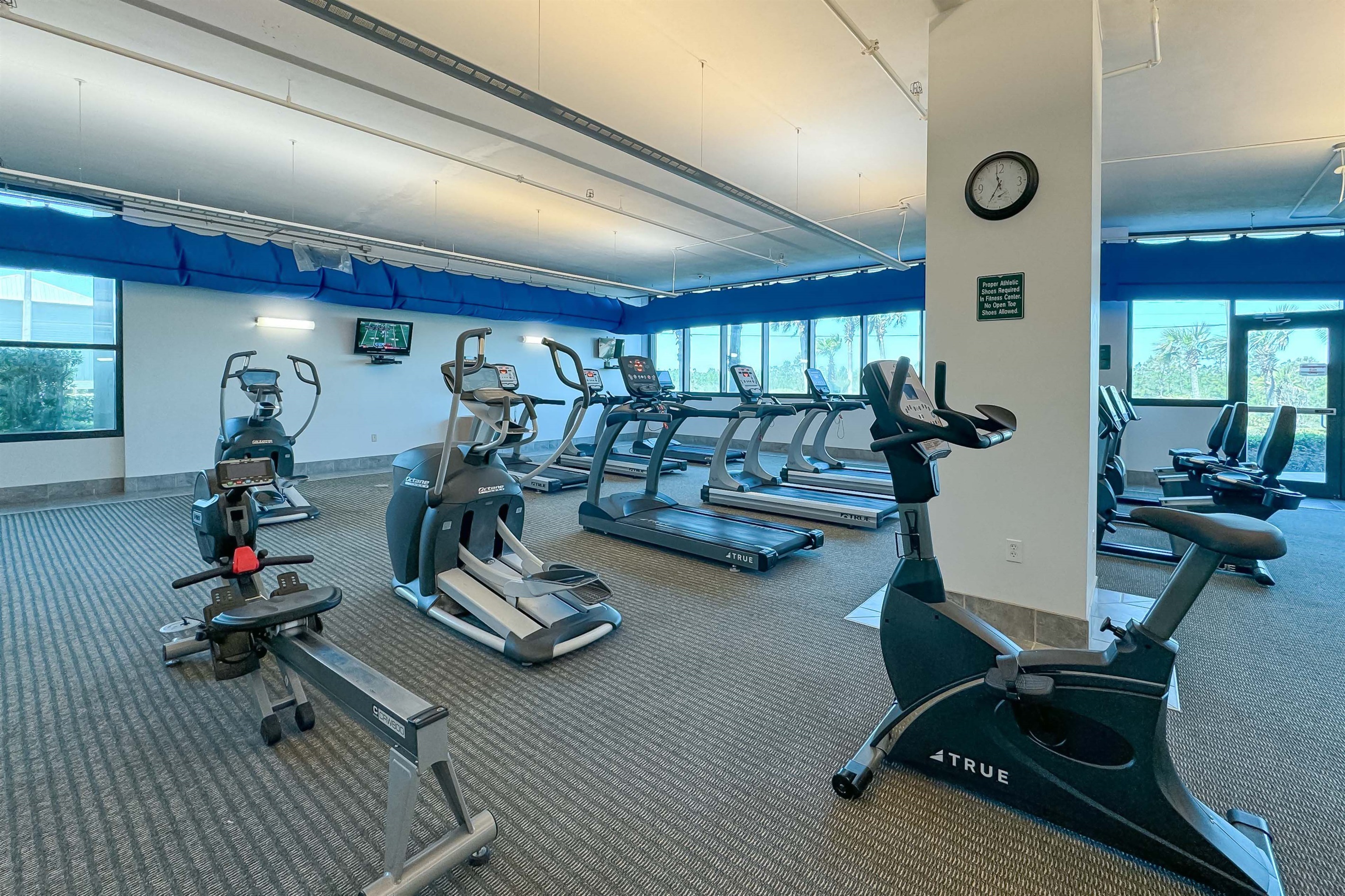 On-site fitness center with panoramic ocean views, providing residents with a premium wellness experience.