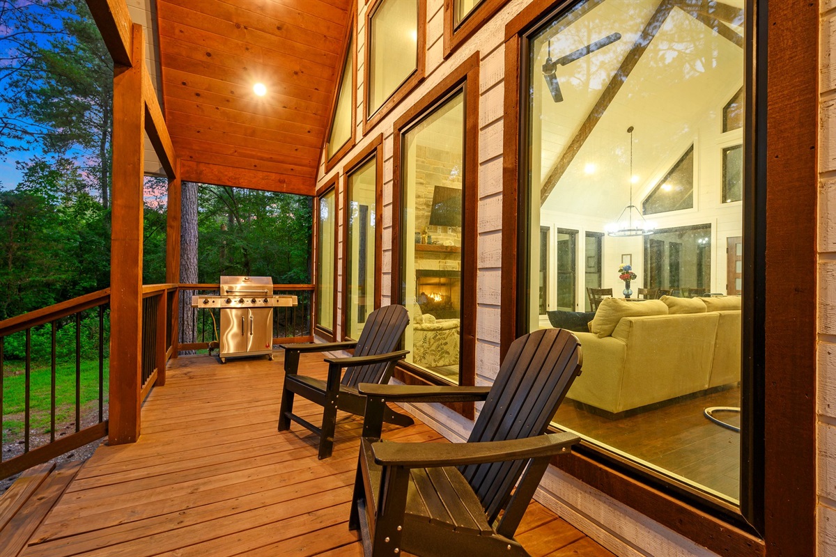 Outdoor Retreat: Enjoy scenic views and grill nights from this stunning deck paradise!