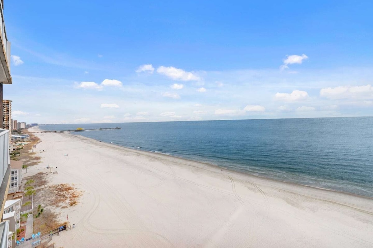 This incredible end-unit features expansive ocean views from both the master bedroom and the living room.