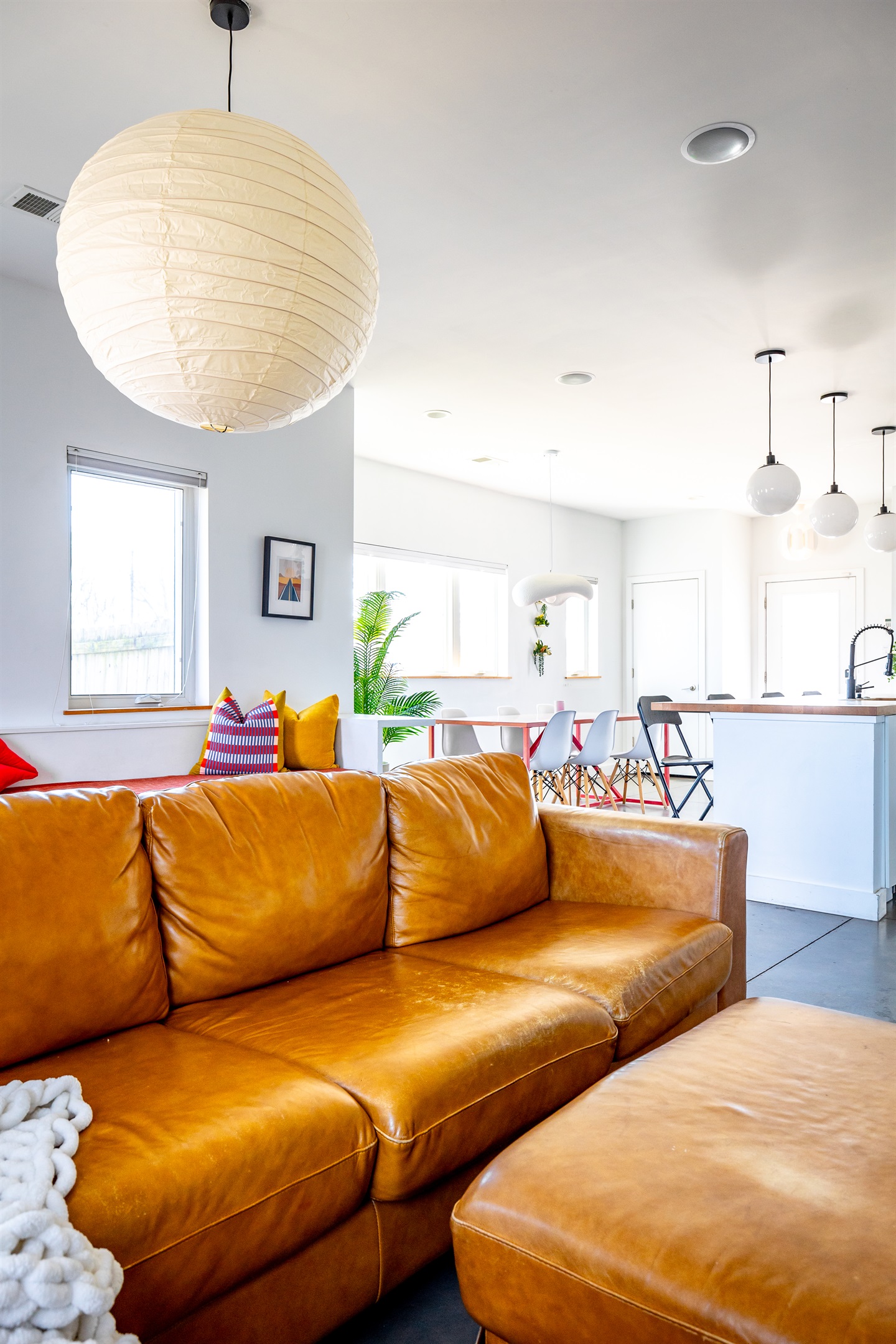 Noguchi with cozy warm lighting in the living room
