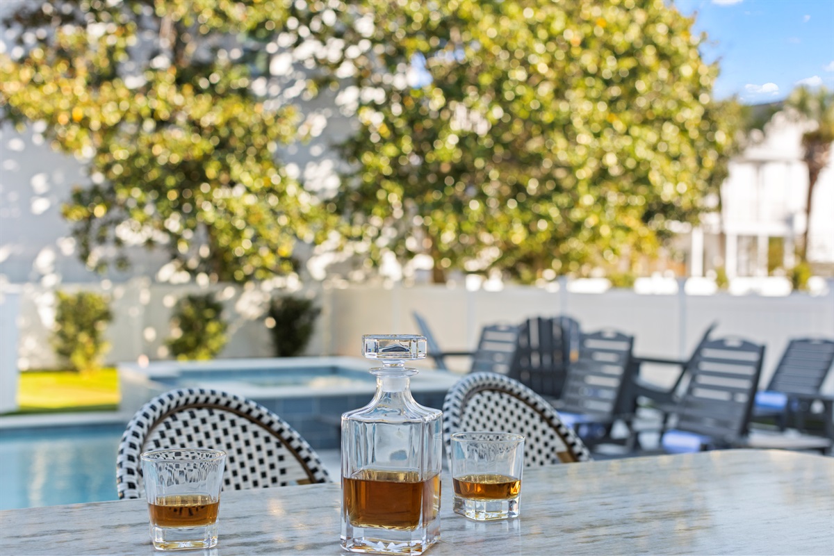 Gas grill is just beside the outdoor bar