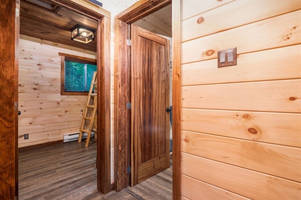 Interior hallway connecting the cottage rooms