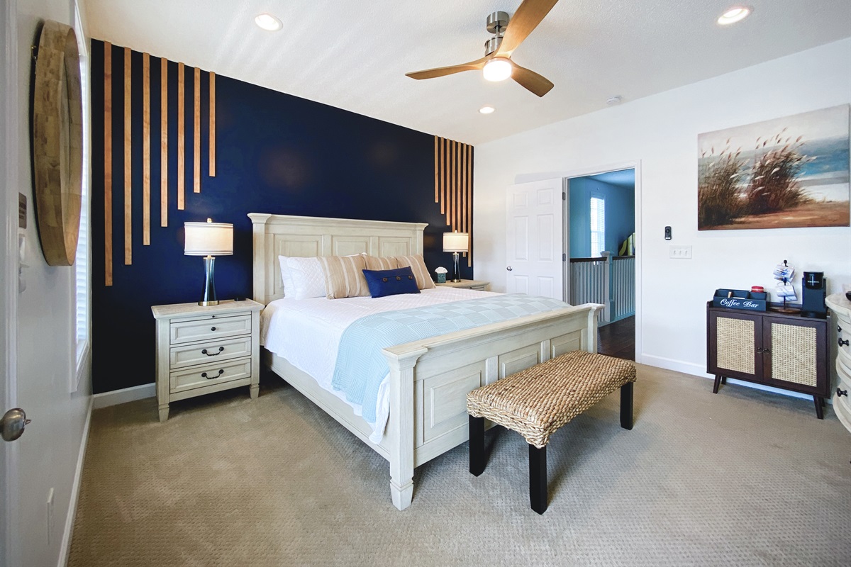 [MasterBedroom] Retreat to our primary bedroom featuring a luxurious king-size bed and an ensuite bath with a relaxing jacuzzi tub. Experience ultimate comfort and indulgence during your stay