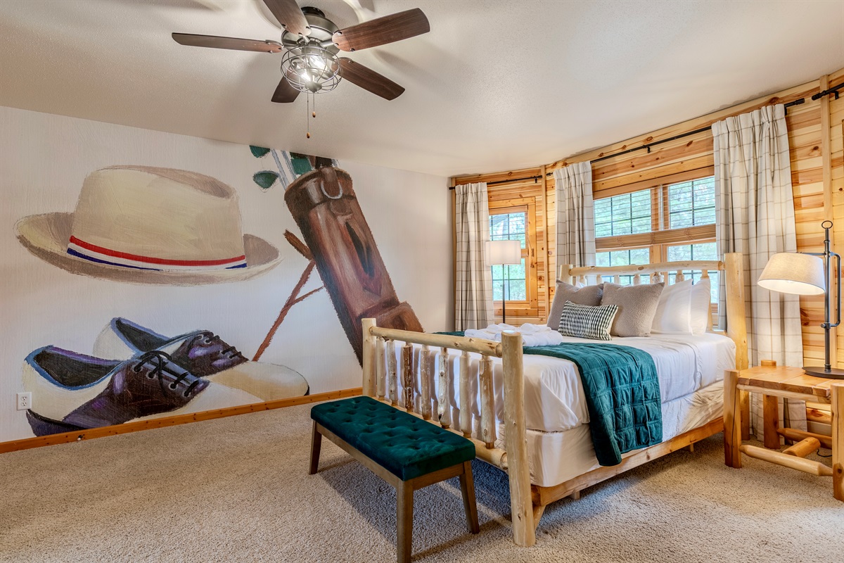 Upstairs bedroom with a queen & double bed.