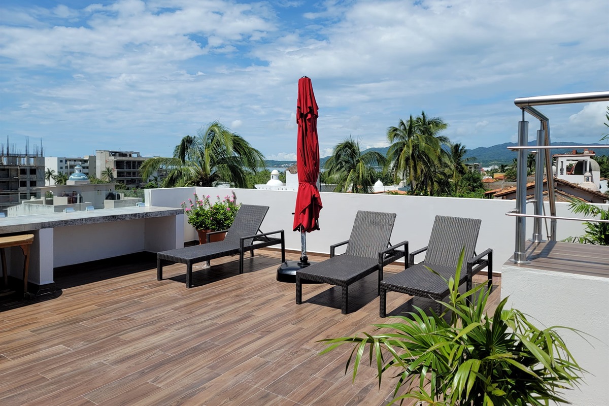 Sun chairs near pool