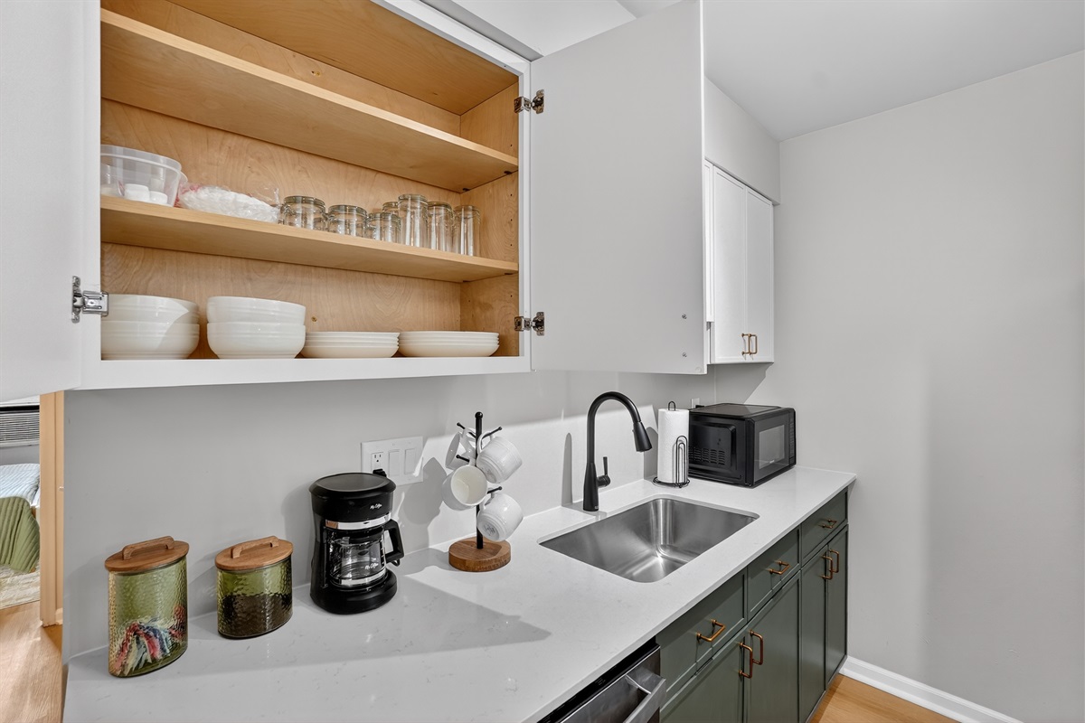 Cups, plates, dishes, utensils, pans, & coffee all provided