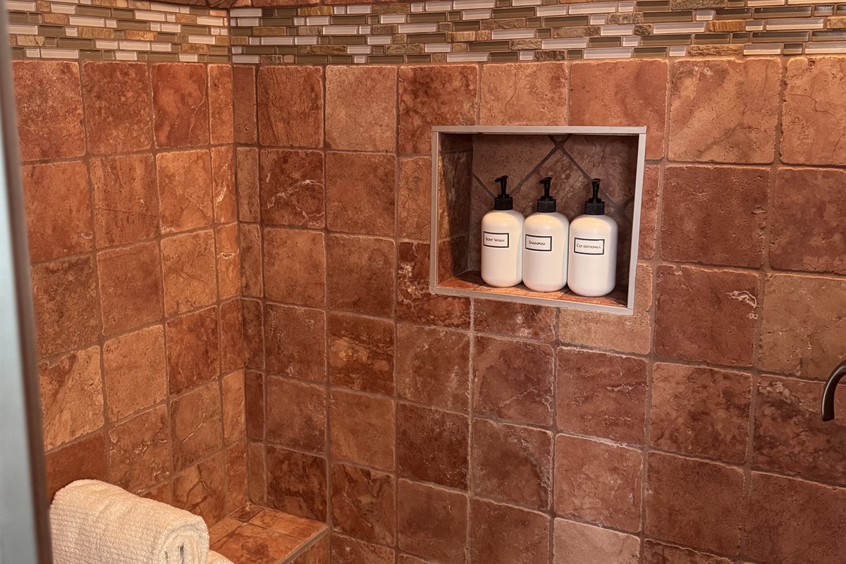 Large walk in Italian marble steam shower  - with provided toiletries 