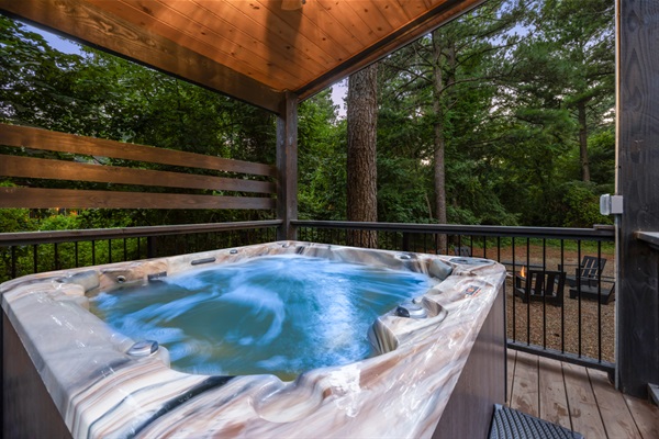 Unwind under the stars in your private hot tub — the perfect way to end a day