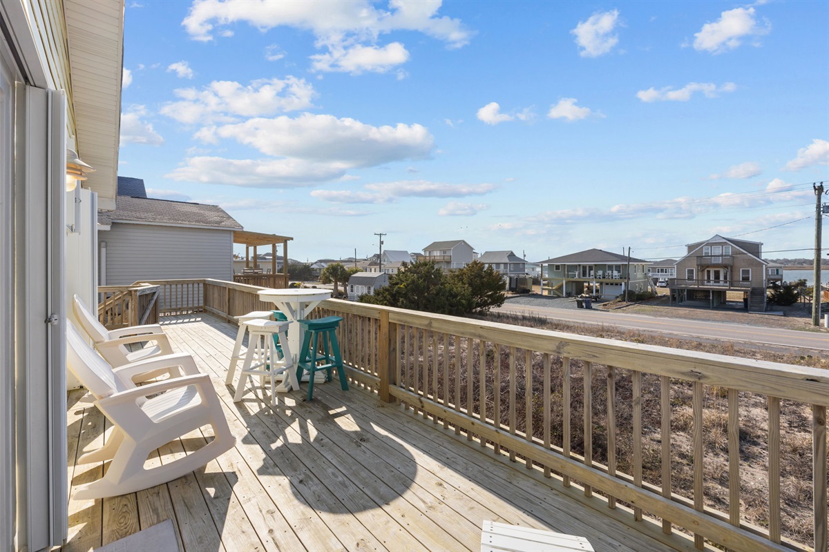 Spacious ocean-air deck with seating for lounging and sunsets