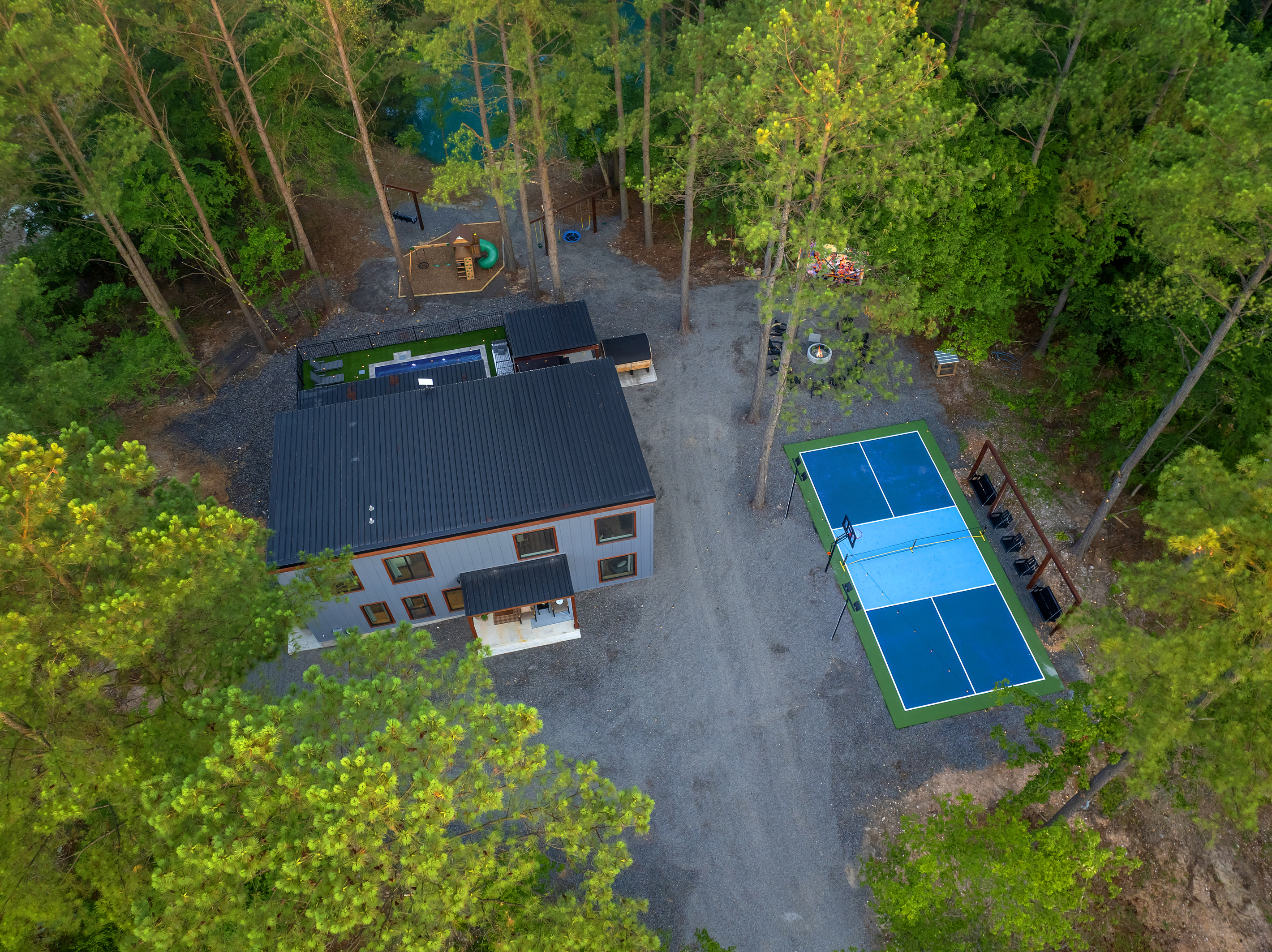 Your private resort, all in one place. From the pool and playset to pickleball, basketball, swings, fire pit, outdoor cinema & fishing pond, there’s something for your group of 10 without ever leaving the property.