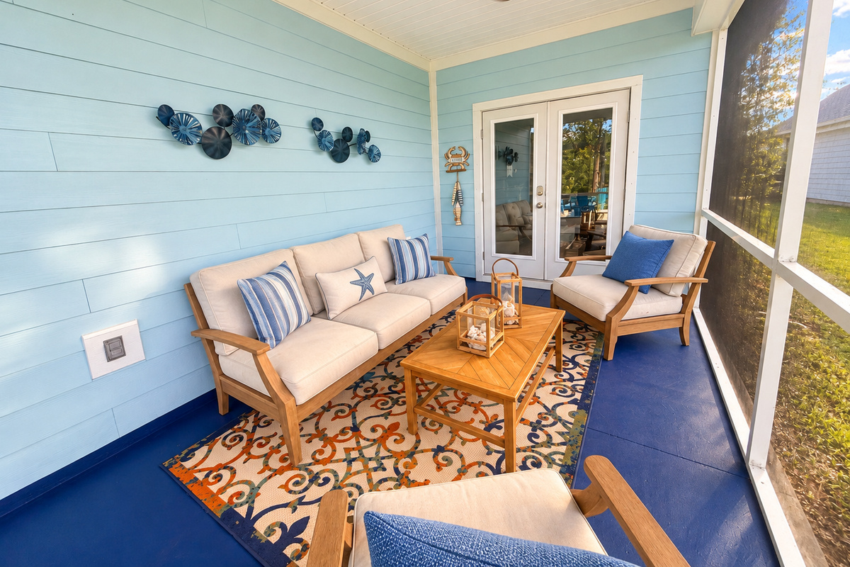 Plush cushions on the back porch make morning coffee comfortable and relaxing