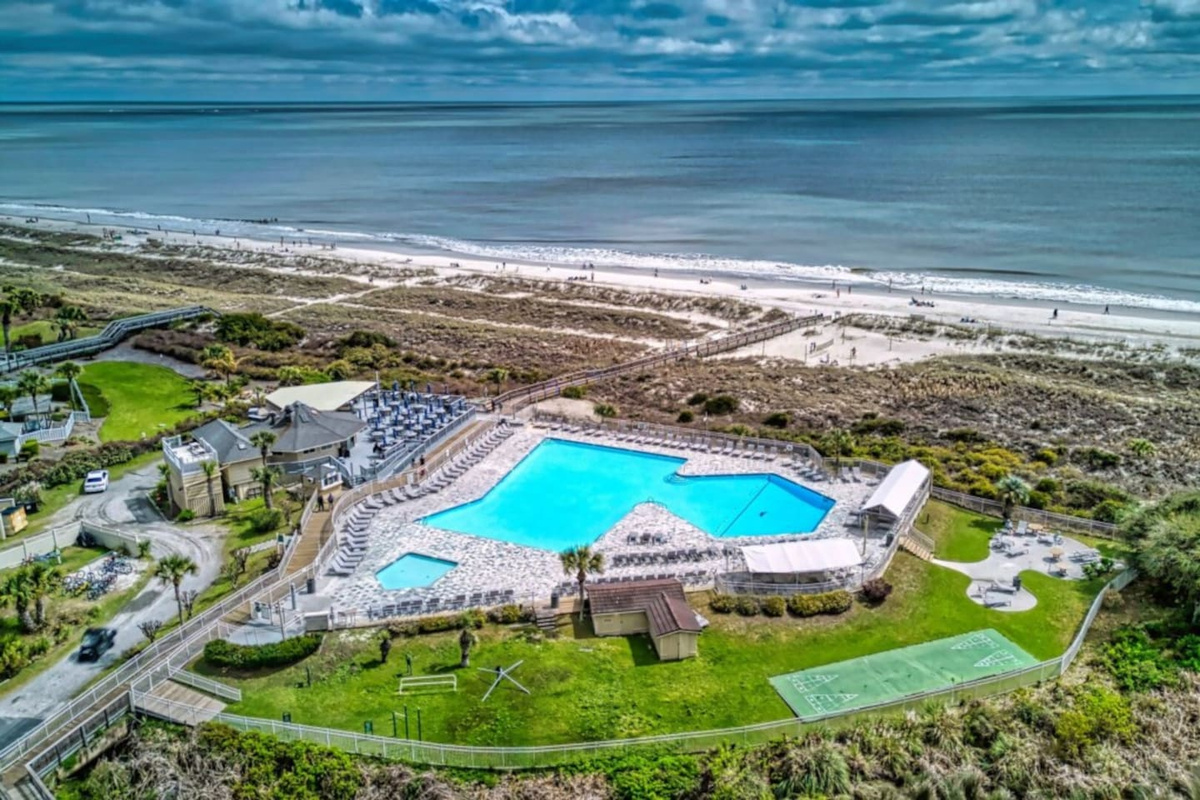 Aerial view of the resort pool and beach
