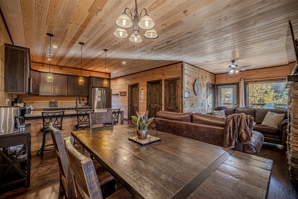 Open dining and living room layout ideal for family meals and game nights.