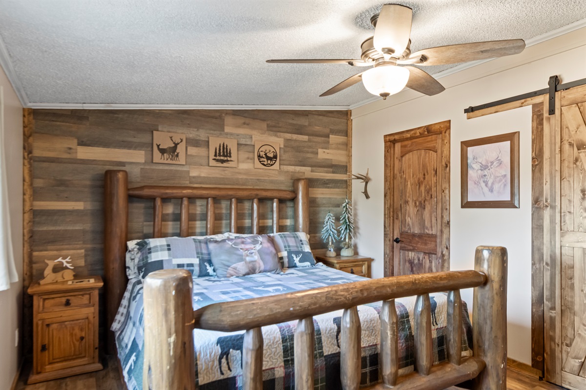 Thoughtfully designed bedroom with a cozy cabin feel.