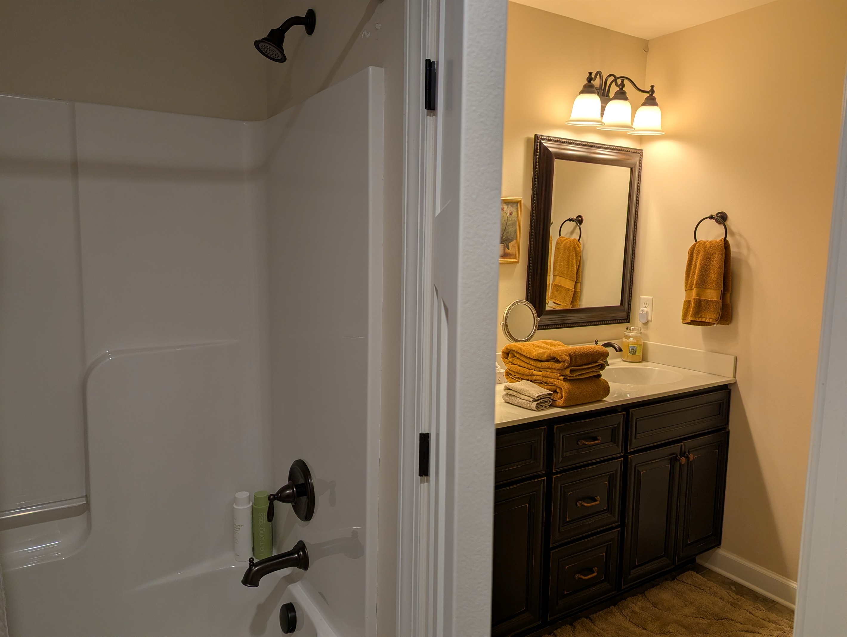 Second bathroom with double vanity and separate shower/ toilet room.
