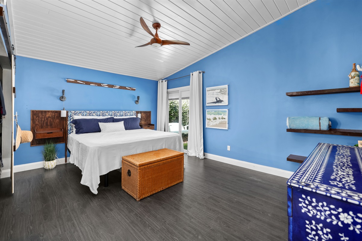 The primary bedroom is designed for relaxation.