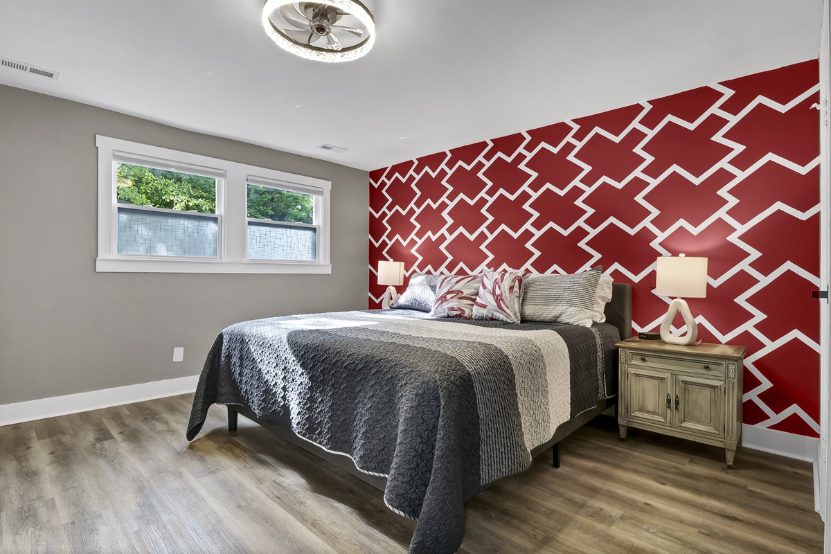Spacious king-sized master bedroom, featuring premium, high-quality linens.