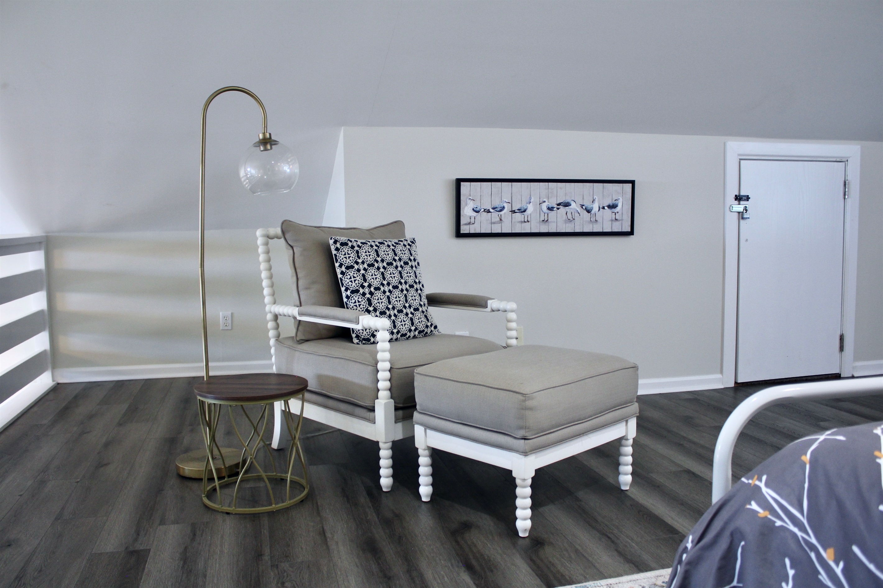 Kick back with your favorite book or enjoy a peaceful moment in this inviting loft nook.