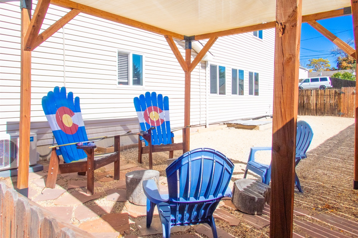 Outdoor Lounge: Unwind in Colorado-inspired chairs under a shaded patio in the backyard!