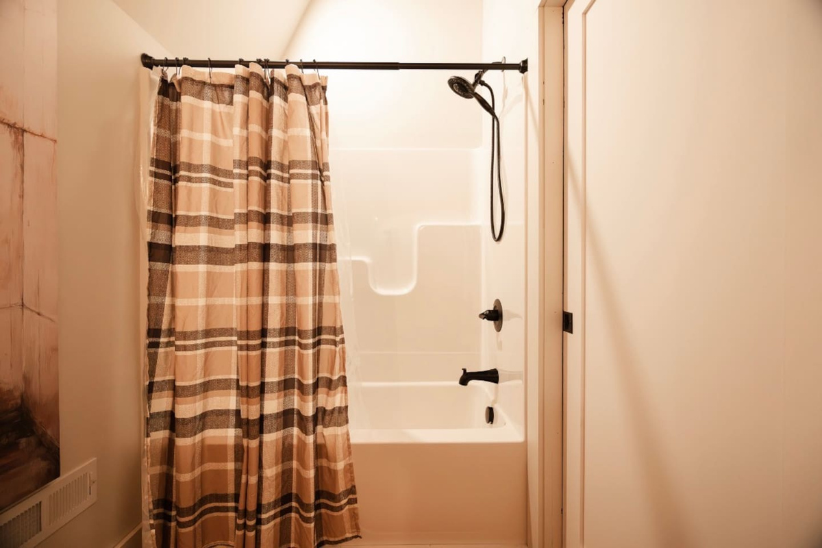 Upper-level full bath, double sink with tub/shower combo 