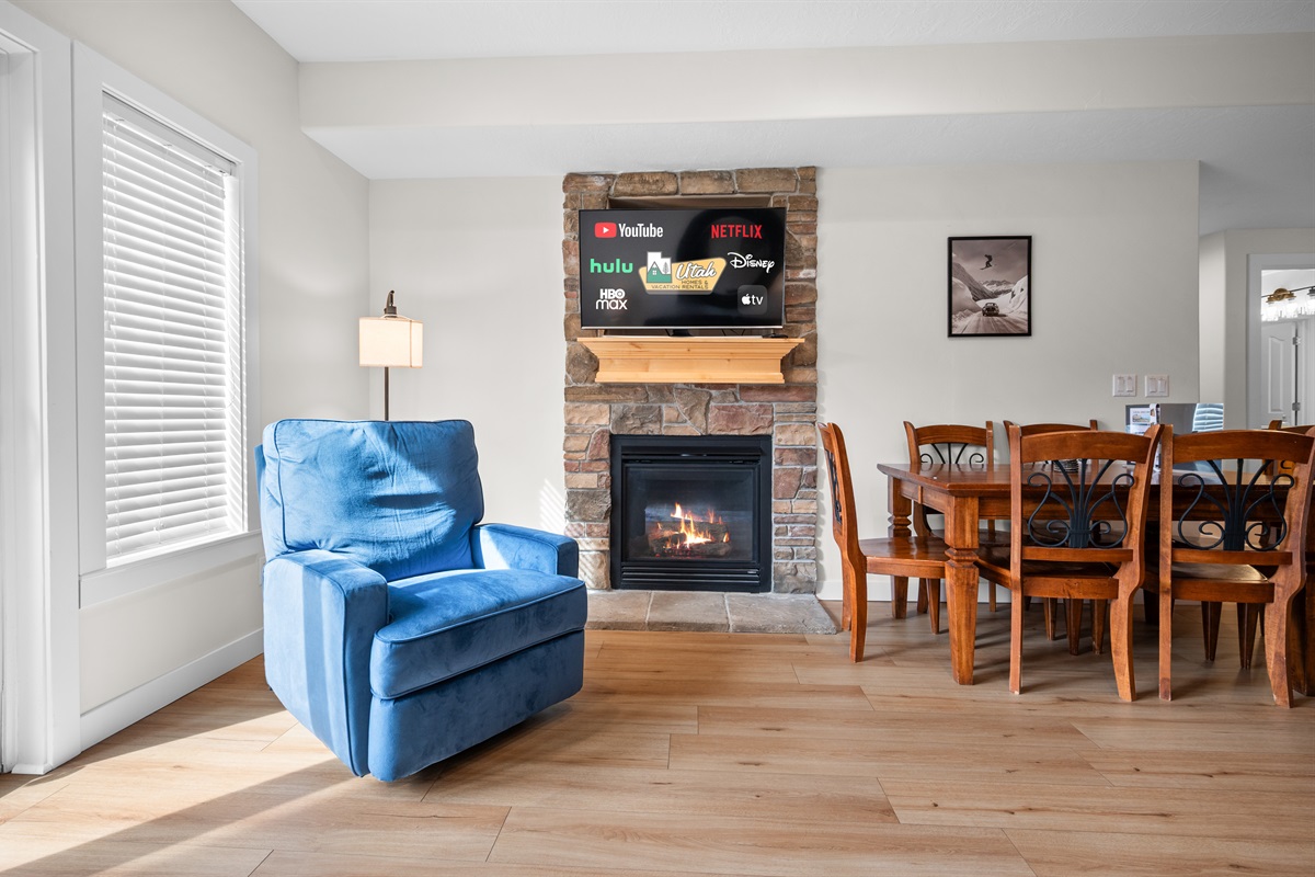 Cozy living area with fireplace and Smart TV—perfect for unwinding after a day outdoors.